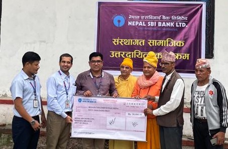 सन्त भवन निर्माणका लागि एसबिआई बैंकको आर्थिक सहयोग