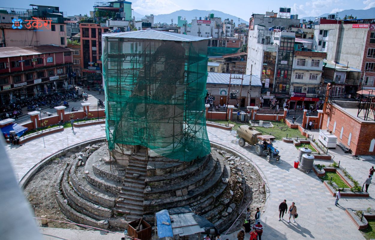 A section of Dharahara destroyed after the earthquake. Even now, it relies on a simple net and tin roof. Photo: Krishpa Shrestha.