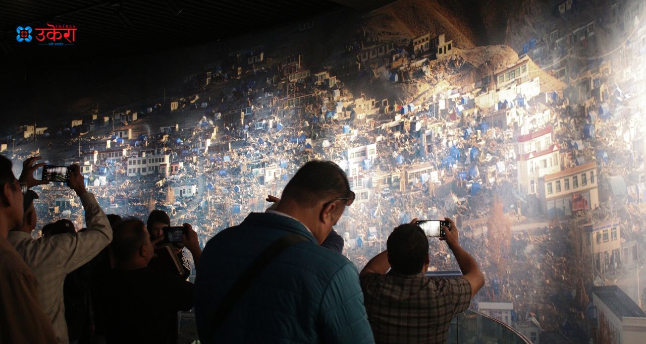 Nepali team taking pictures of Yushu city turned into rubble after the earthquake while observing the museum. Photo: KP Dhungana